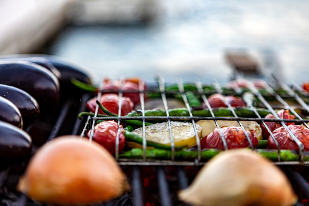 Barbecue (grill) of food over charcoal outside in the summer. Istanbul, Turkey, July 2020.